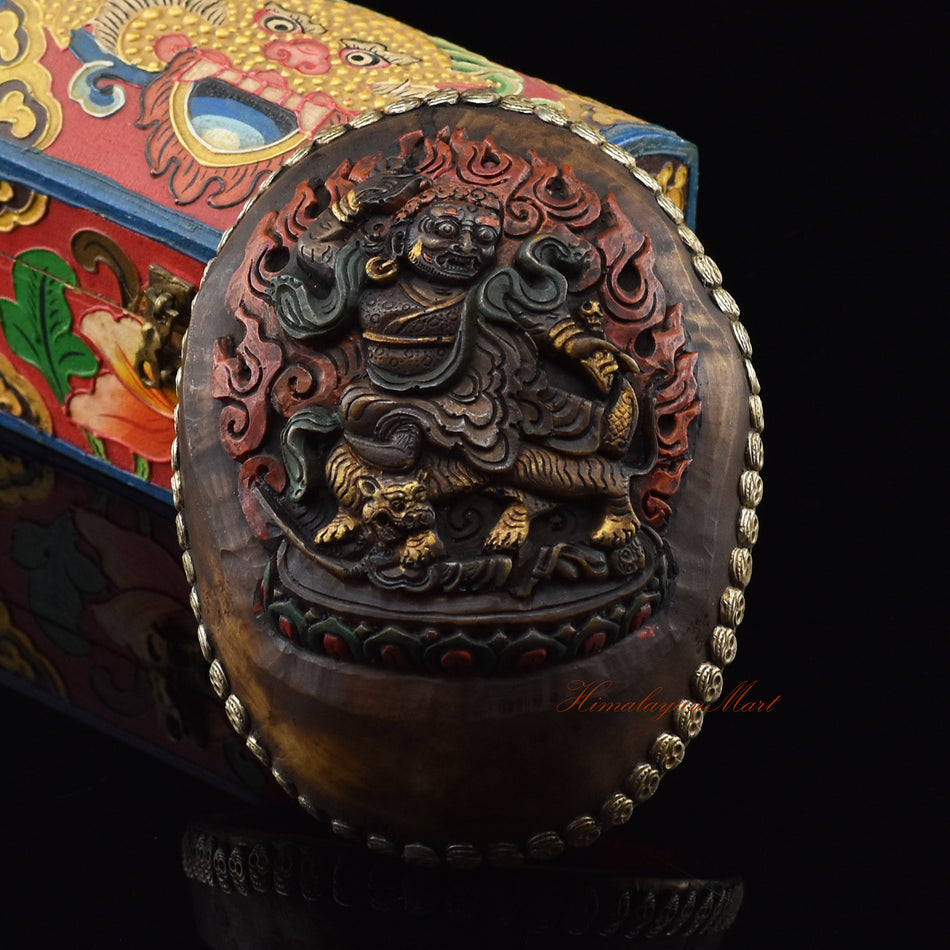 Dorje Drolo Carved Resin Kapala showing the wrathful manifestation of Guru Rinpoche at the center of the design