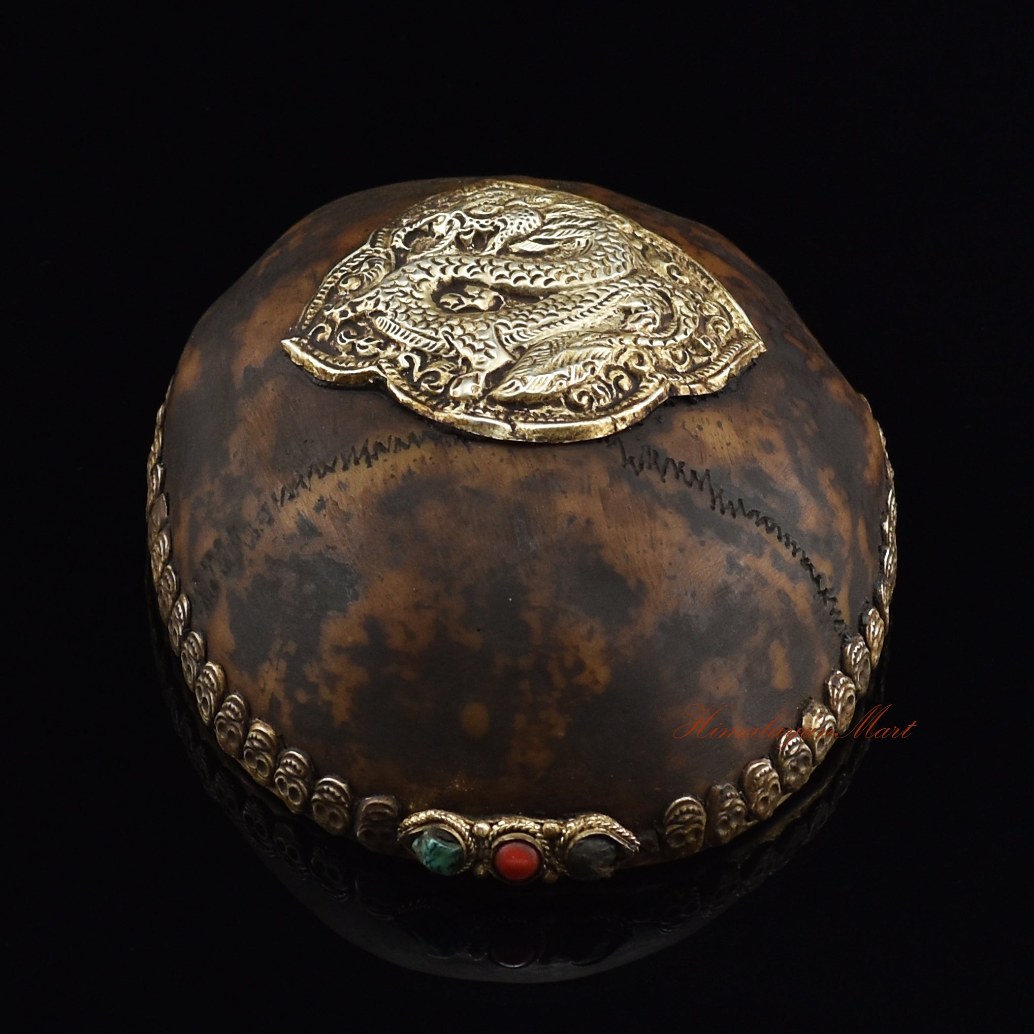 Dragon-embedded resin kapala, bottom view of resin base