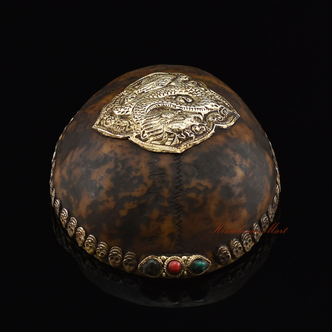 ragon-embedded resin kapala, top view showing kapala design