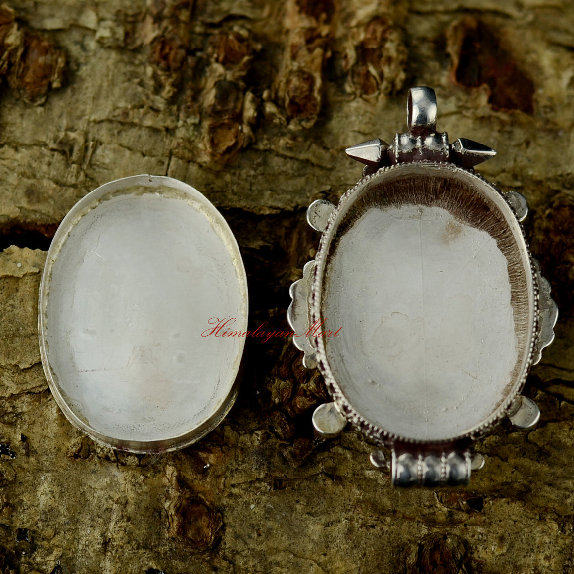 Opened Dzambhala Wealth Deity Pendant revealing traditional ghau locket interior and detailed silver craftsmanship.