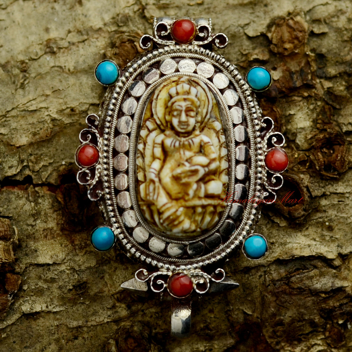 Dzambhala Wealth Deity Pendant crafted in silver ghau, featuring Yellow Dzambhala with coral and turquoise inlay.