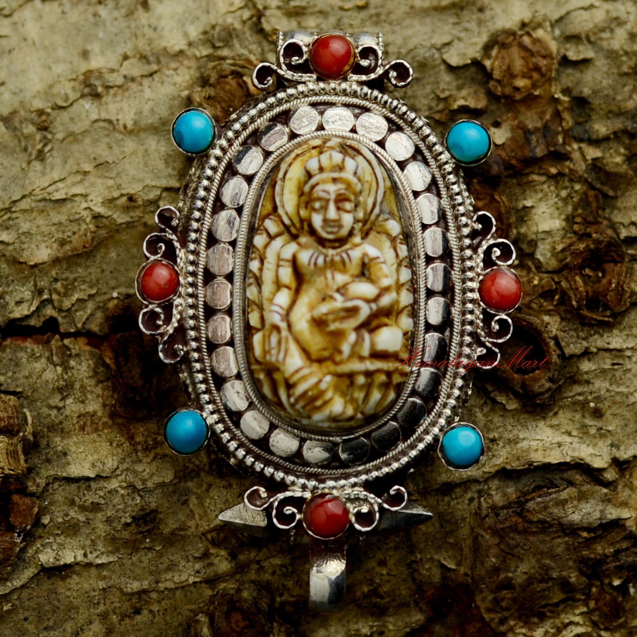 Dzambhala Wealth Deity Pendant crafted in silver ghau, featuring Yellow Dzambhala with coral and turquoise inlay.