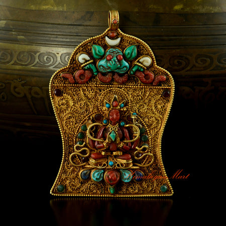 Four Armed Avalokiteshvara Pendant with gold-plated silver and gemstone inlay, front view