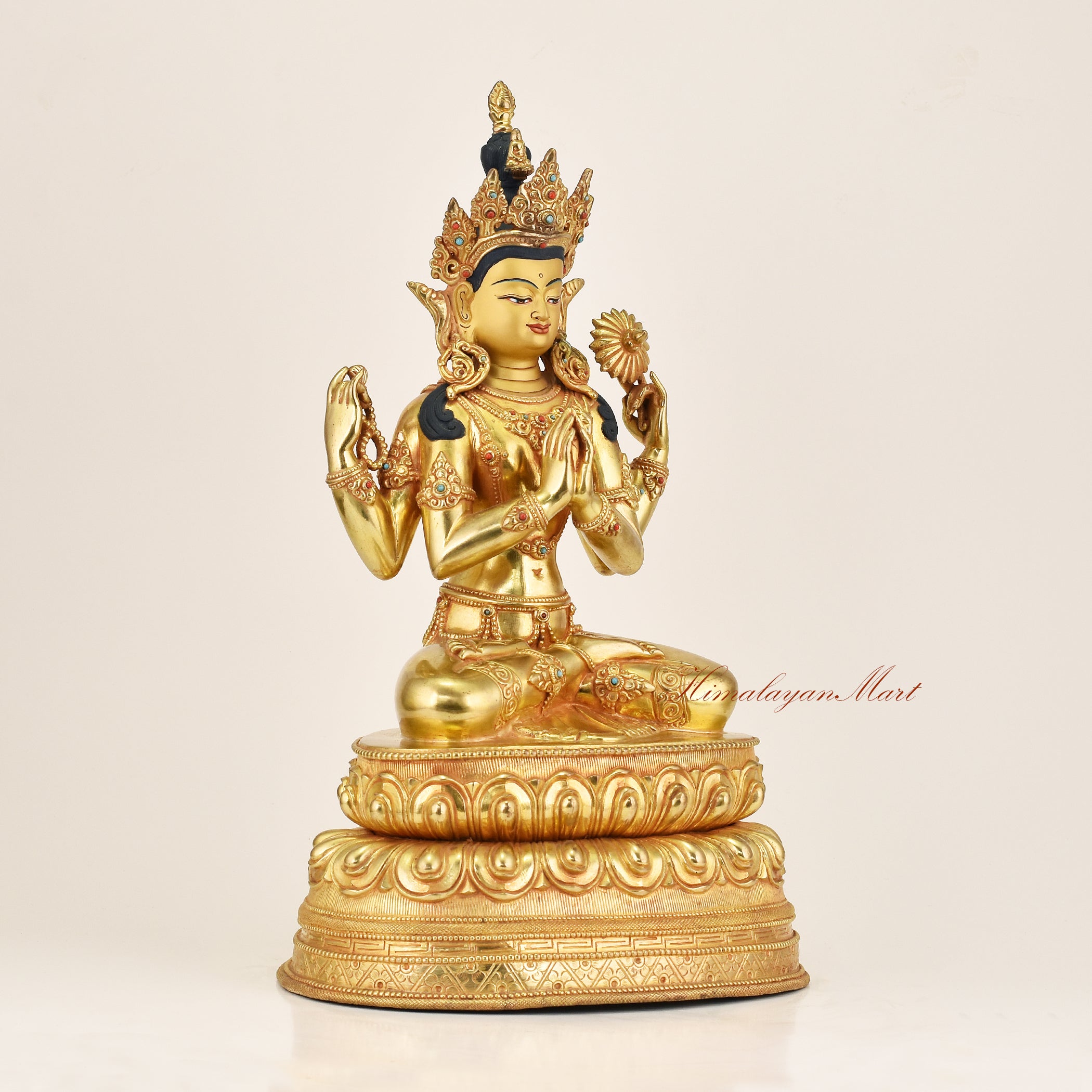 Right side view of Four-Armed Avalokiteshvara Statue showing copper alloy casting and gold gilding detail