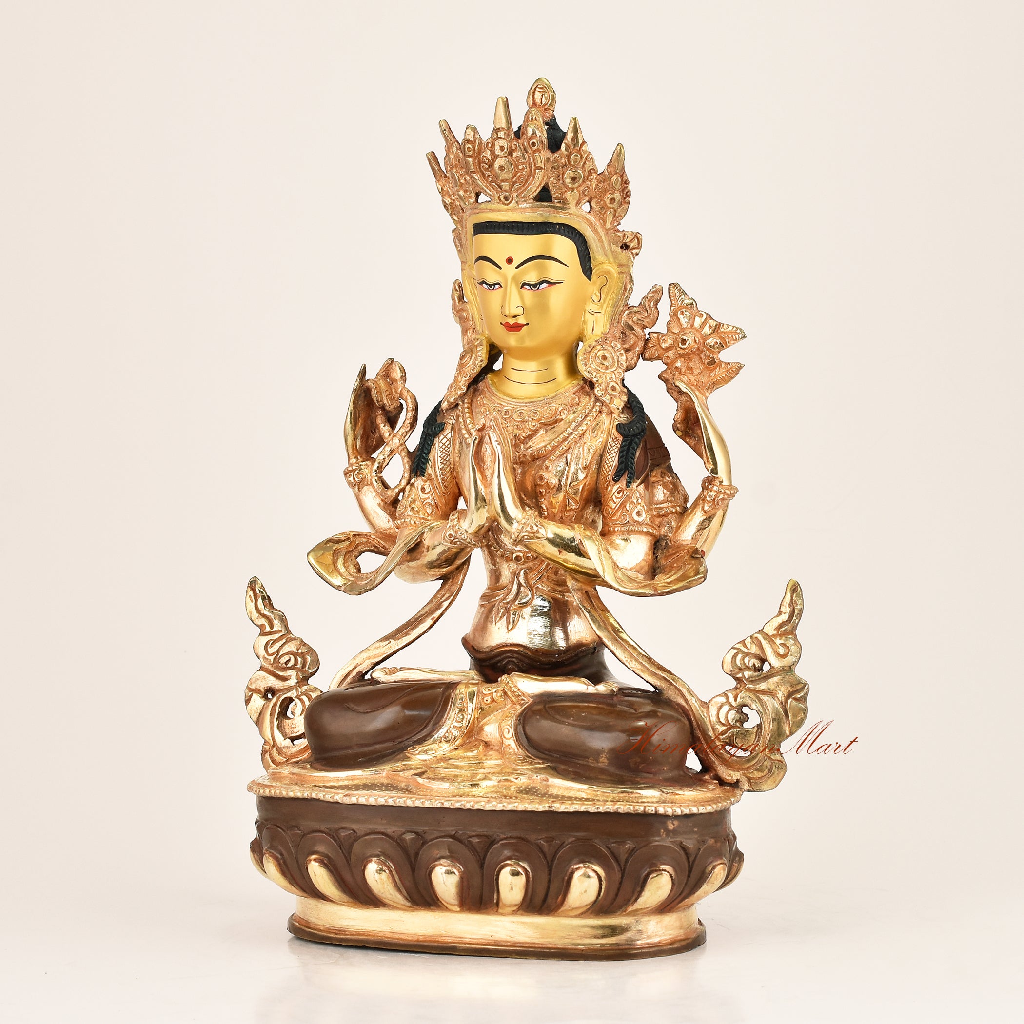 Left side view of the Four-Armed Chenrezig Statue revealing intricate copper alloy craftsmanship, white lotus detailing, five-jeweled crown, and flowing garment engravings by Nepali master artisans