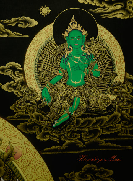 Green Tara seated on lotus base below the sun in Four-Armed Chenrezig Thangka.