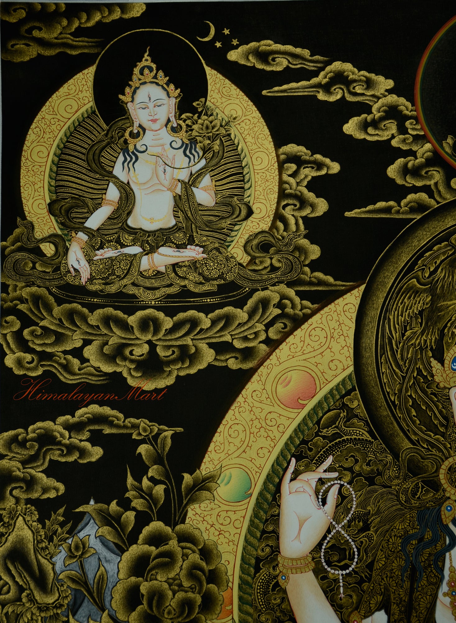 White Tara beneath moon and stars on lotus base in Chenrezig Thangka painting.