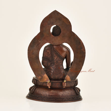 Back view of Framed Medicine Buddha Statue crafted using the traditional Lost-Wax Method