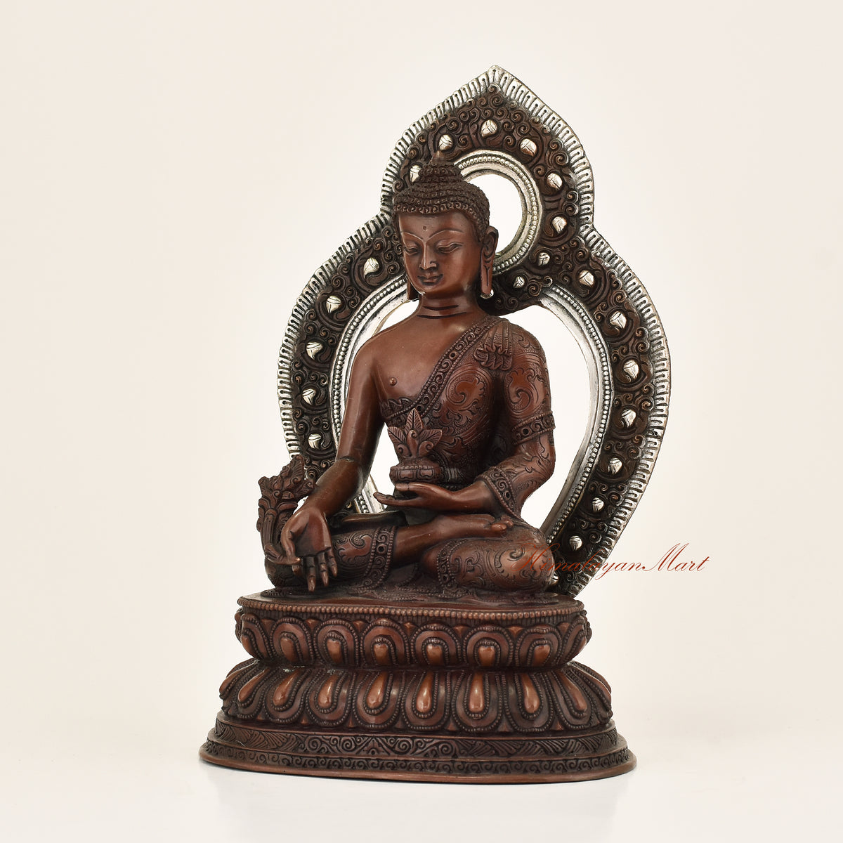 Left side view of Framed Medicine Buddha Statue showing carved flowers and vines