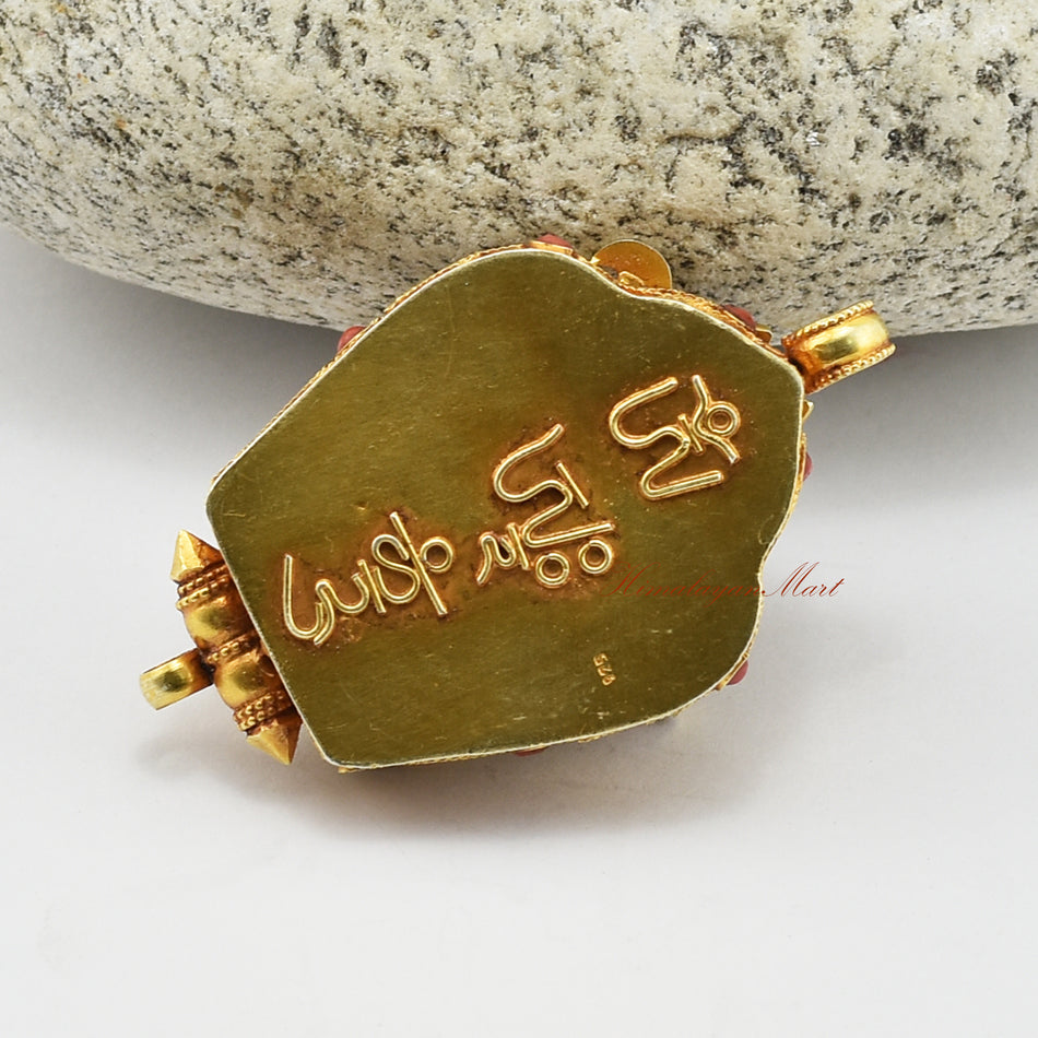 Back view of Ganesha Silver Ghau Pendant showing detailed handcrafted silver design and fine Nepali artistry.