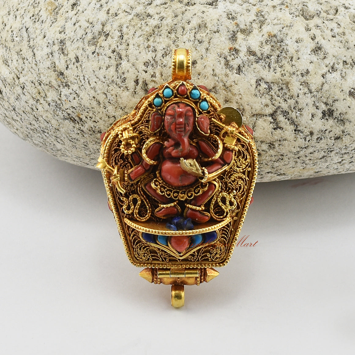 Handcrafted Ganesha Silver Ghau Pendant made of gold-plated silver with coral, turquoise, and lapis gemstones.