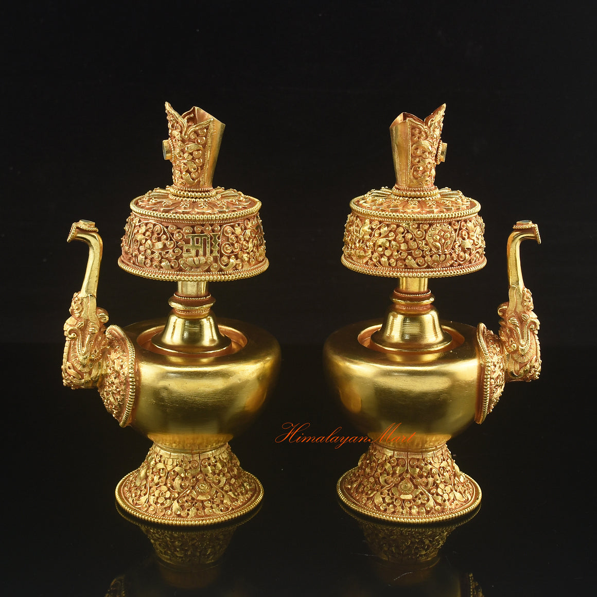 Outward-facing view of Gold Plated Bhumba displaying detailed Buddhist motifs and elegant ritual form.