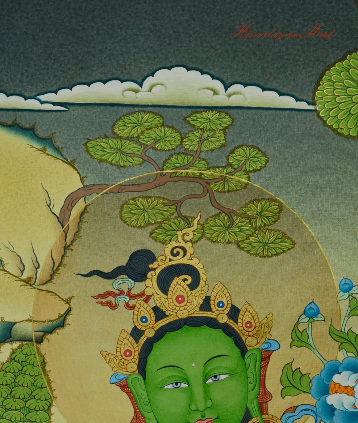 Close-up of Green Tara’s jeweled crown in the hand-painted meditation thangka