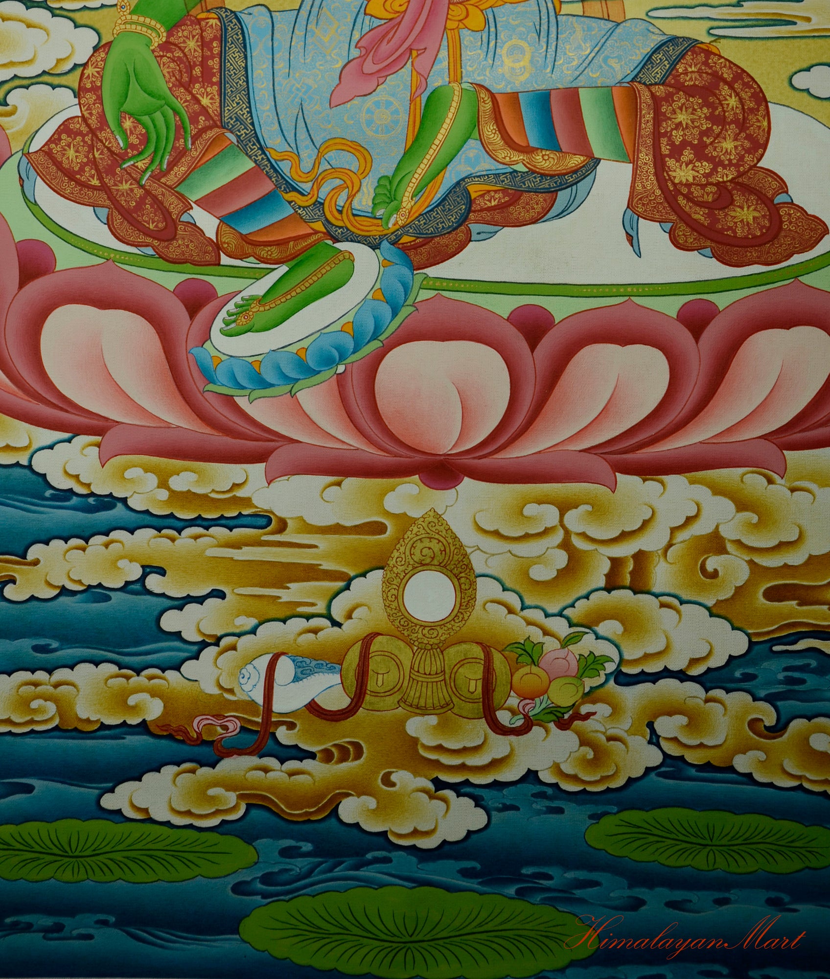 Green Tara’s legs in meditation posture above the hovering lotus base on clouds
