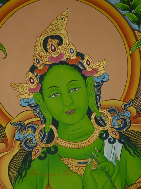 Face detail of Green Tara Meditation Thangka, hand-painted Tibetan artwork showing serene expression and colorful robes.