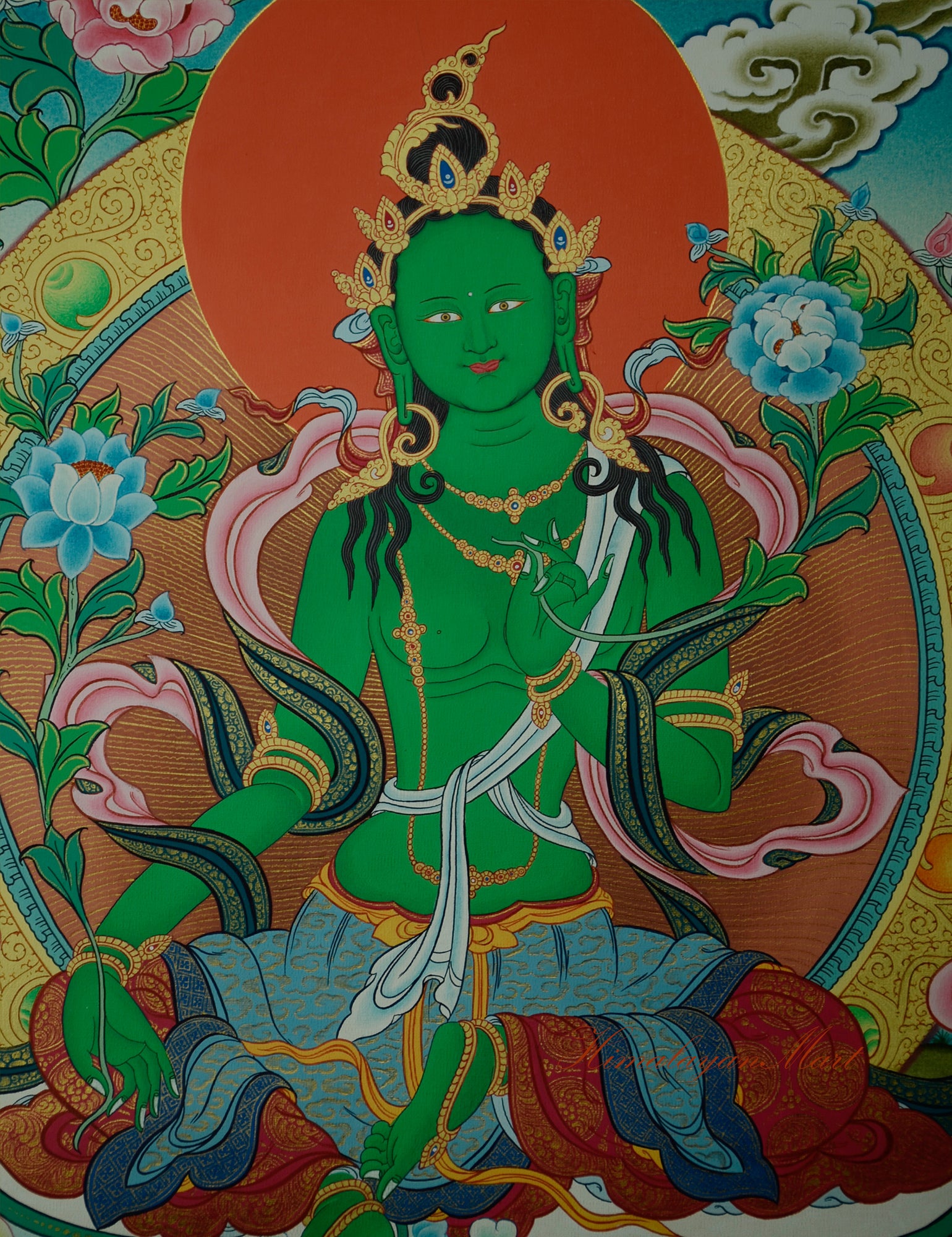 Detailed view of hand-painted Green Tara Thangka showing intricate patterns and sacred symbols.