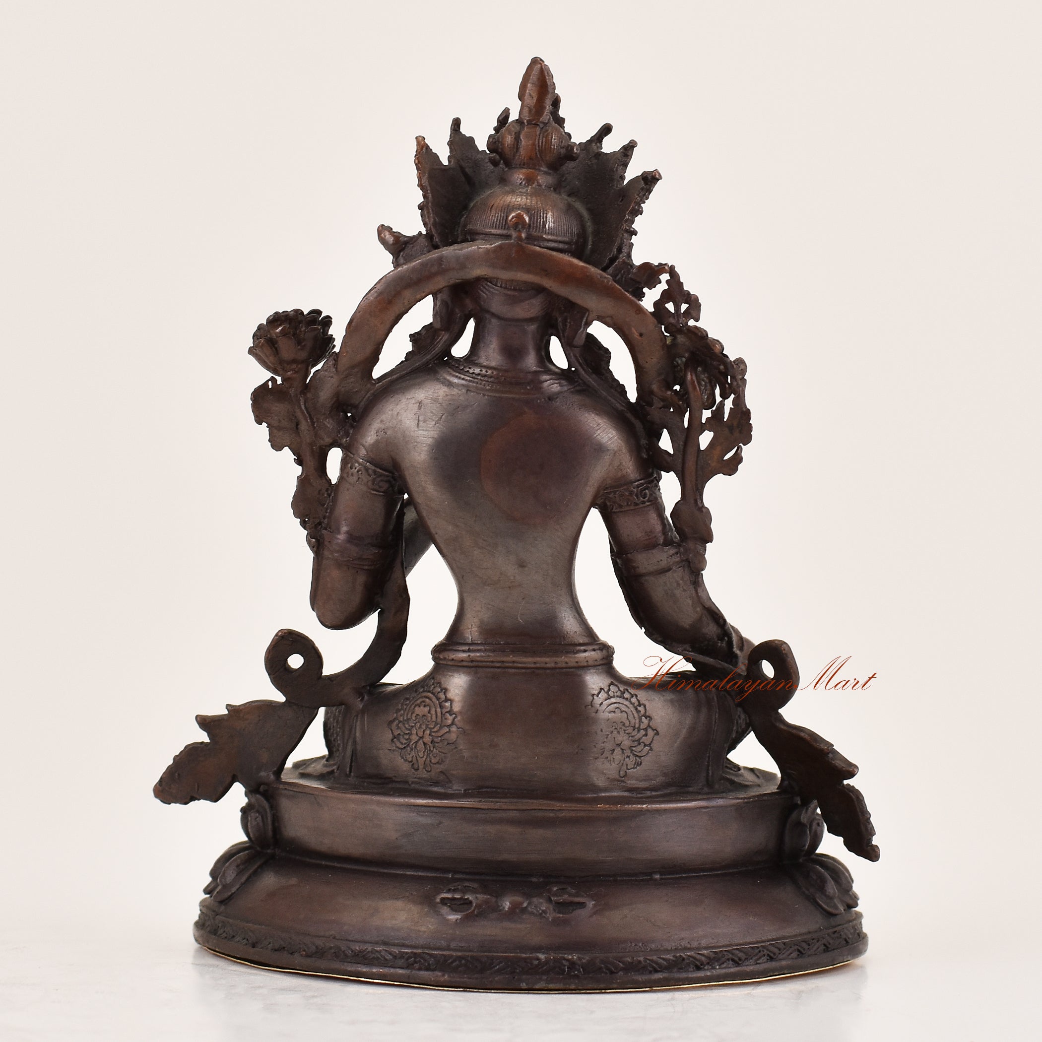 Back view of handcrafted Green Tara statue for sale, Tibetan Buddhist altar sculpture.