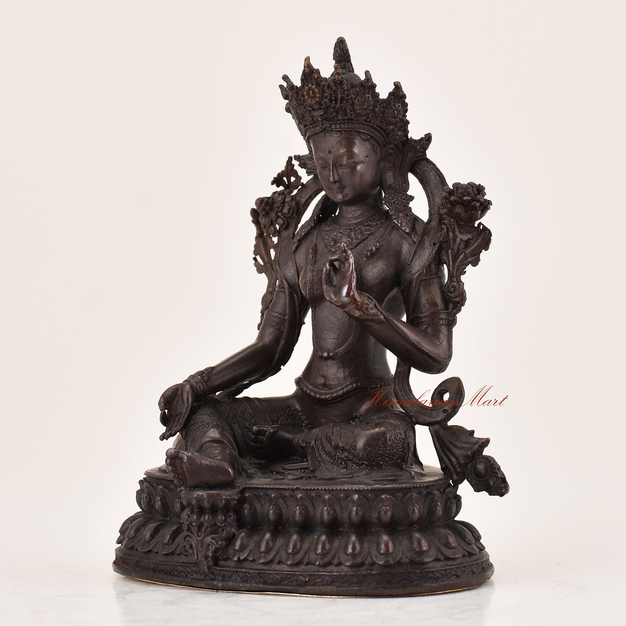 Left-side view of handcrafted Green Tara statue for sale, Tibetan Buddhist altar sculpture.