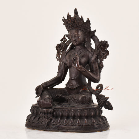 Left-side view of handcrafted Green Tara statue for sale, Tibetan Buddhist altar sculpture.
