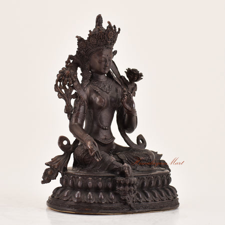 Right-side view of handcrafted Green Tara statue for sale, Tibetan Buddhist altar sculpture.