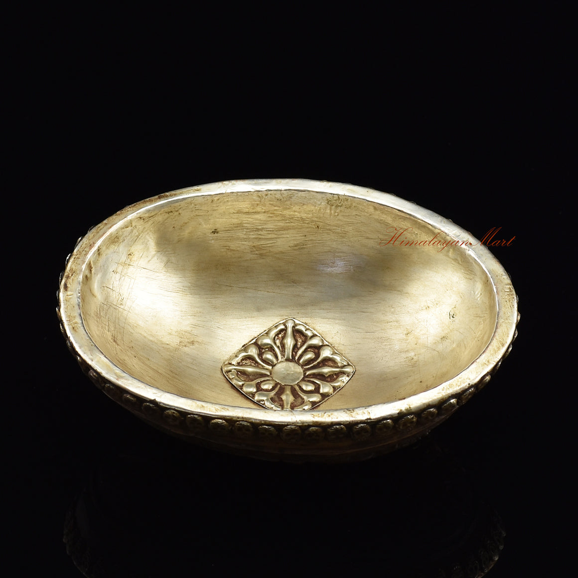 Elevated angle view of the Guru Dragpur resin kapala showing overall sculpted form