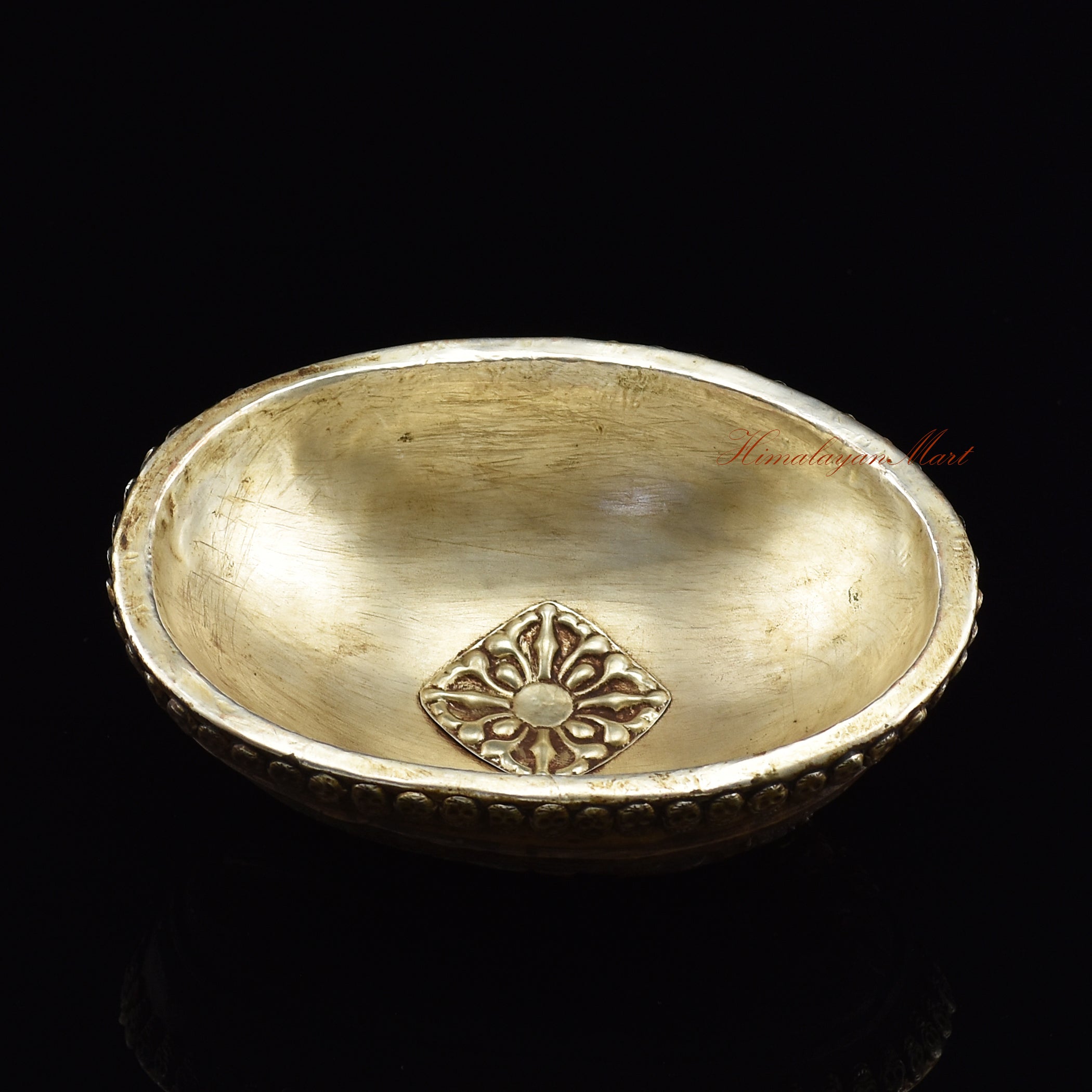 Elevated angle view of the Guru Dragpur resin kapala showing overall sculpted form