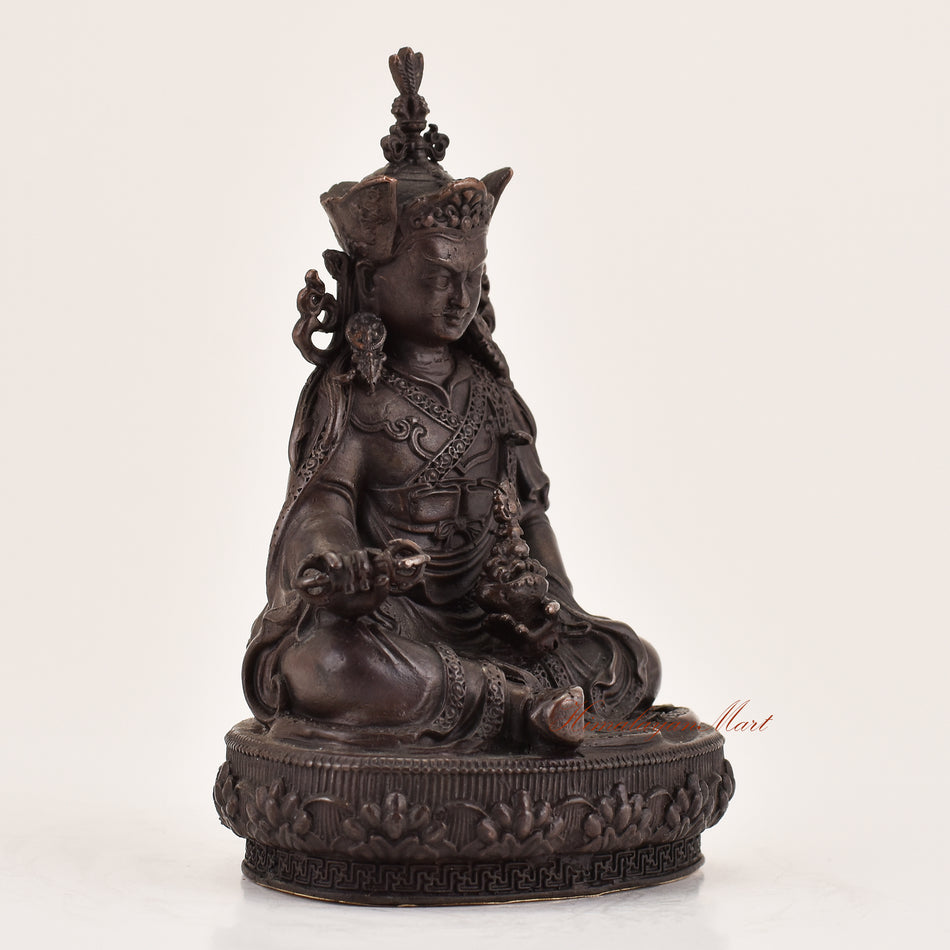 Right-side view of handcrafted Guru Padmasambhava statue for sale, sacred Tibetan Buddhist altar and meditation sculpture.
