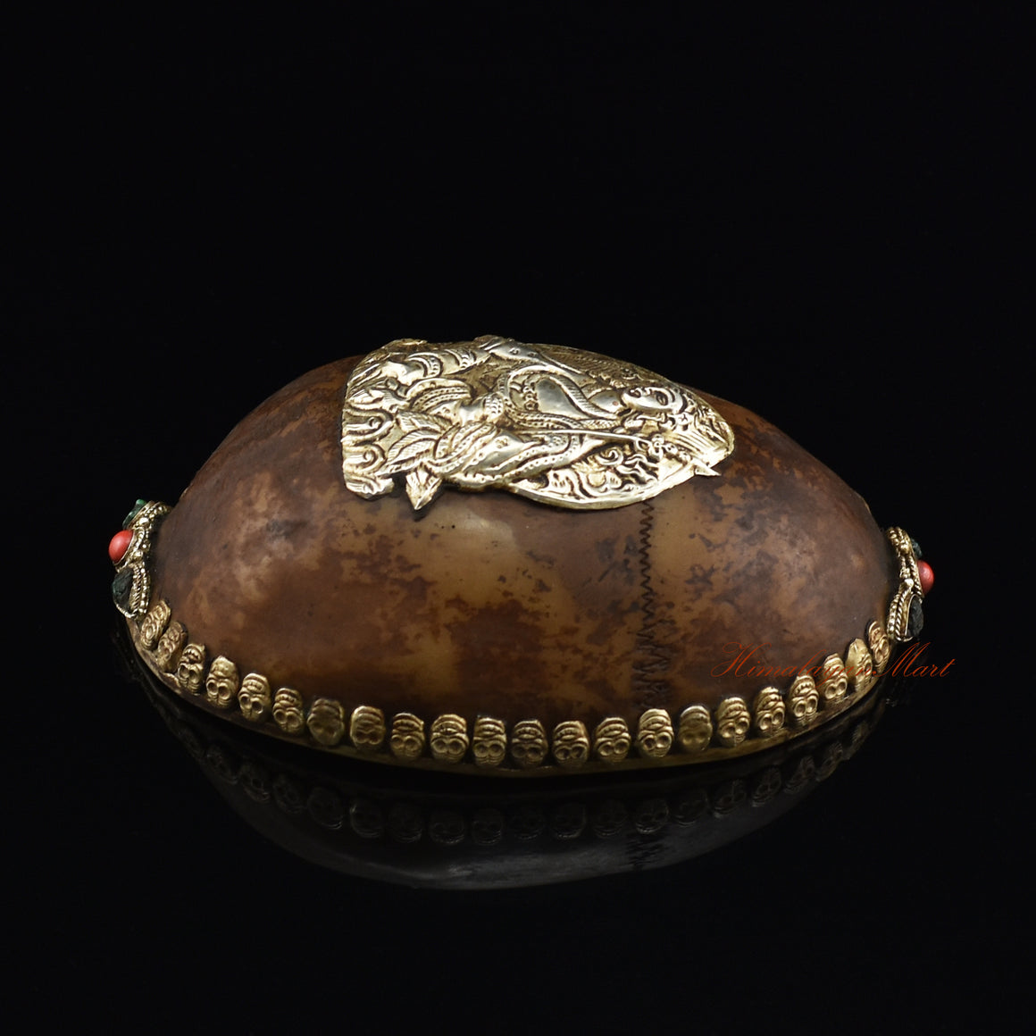 Right side view of the Guru Rinpoche-Embedded Resin Kapala showing the intricate skull border and colorful stone detailing
