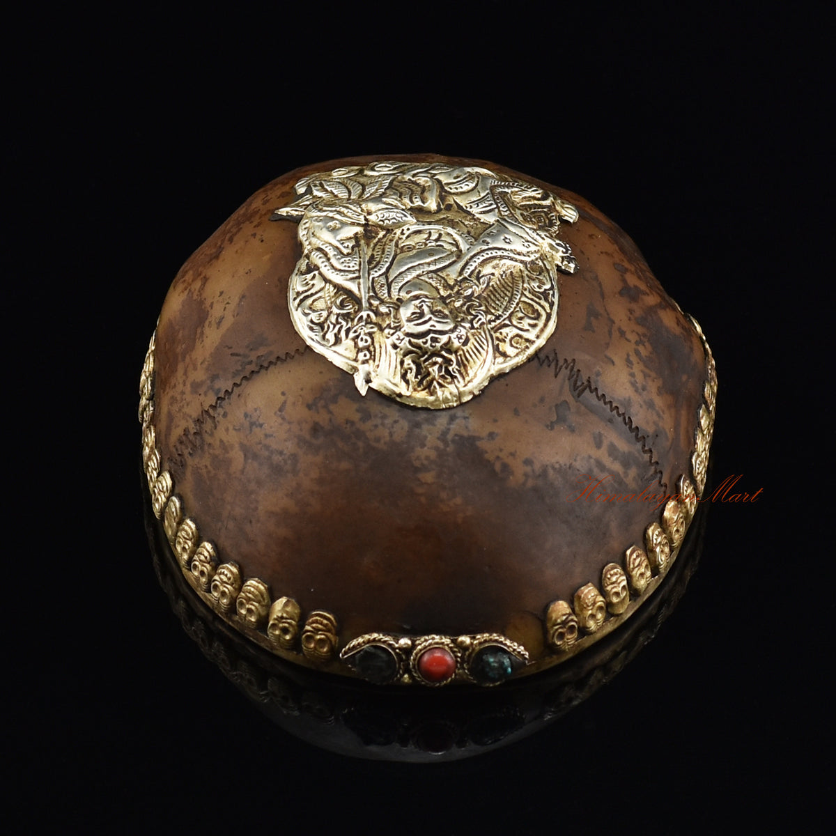 Top view of the Guru Rinpoche-Embedded Resin Kapala displaying the embedded Padmasambhava figure and skull-border design