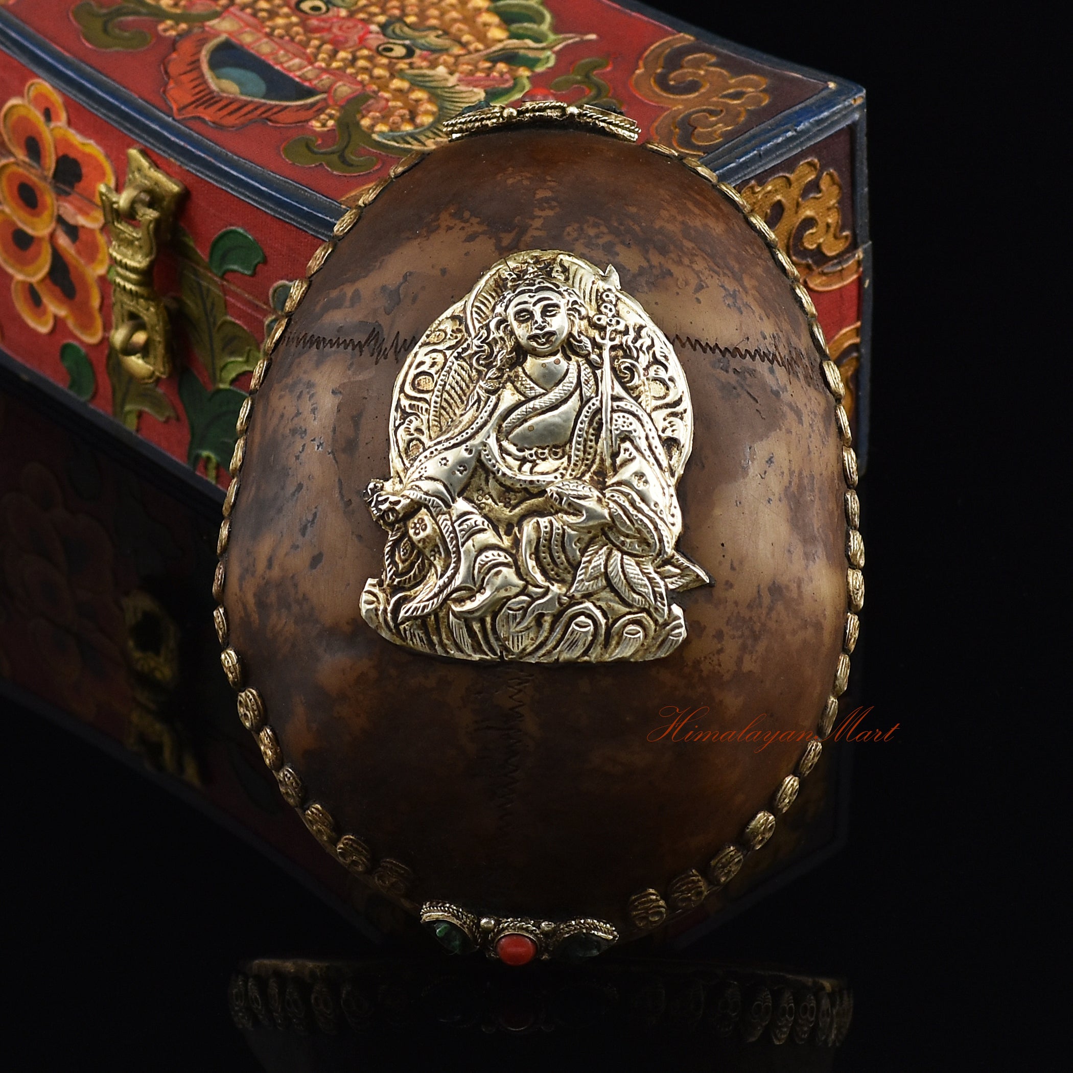 Guru Rinpoche-Embedded Resin Kapala with an ornate skull border and silver-plated copper accents, front view