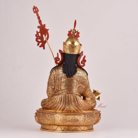 Back view of the Guru Rinpoche (Padmasambhava) Statue displaying robe patterns, halo design, and ornamental details.