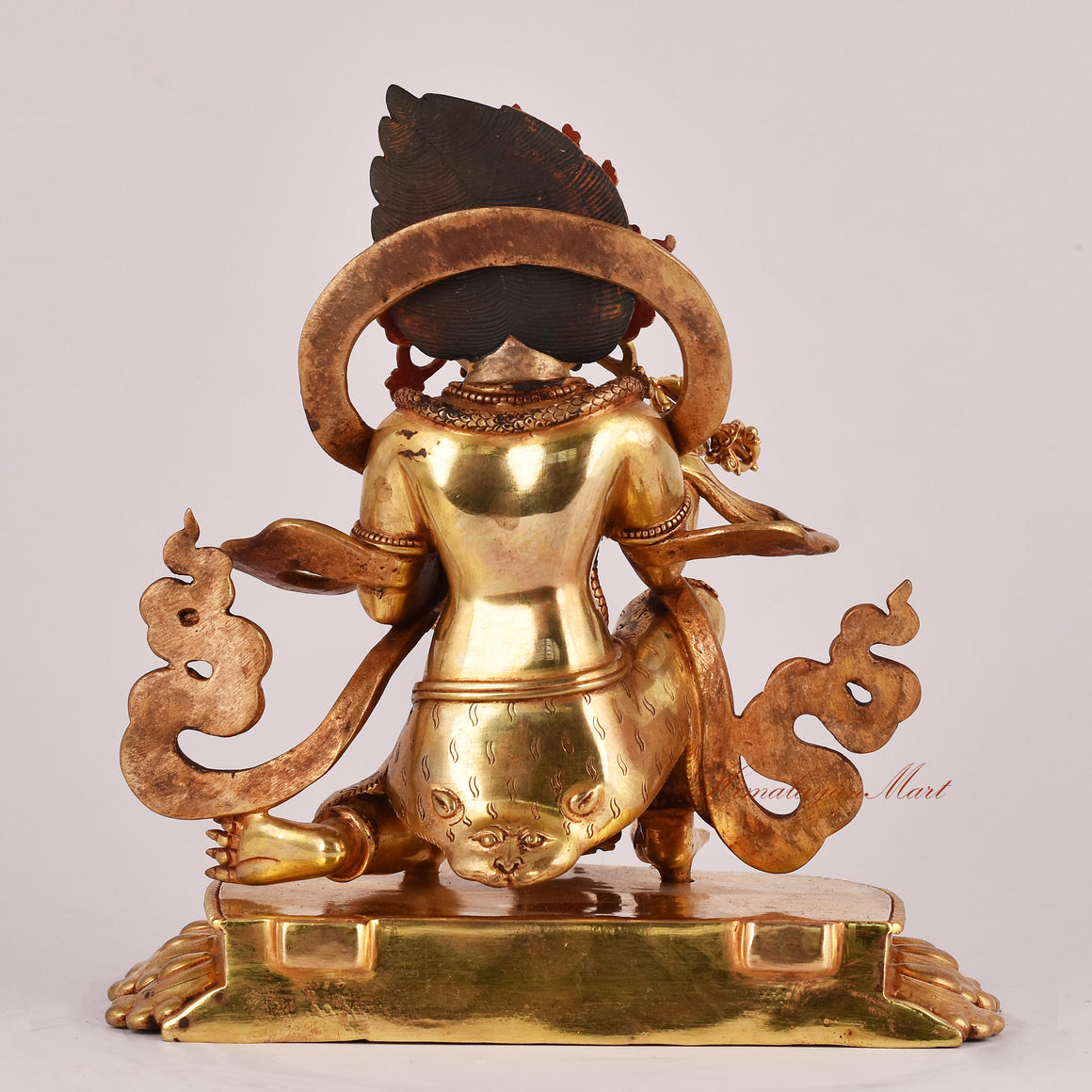 Back view of the Half-Kneeling Vajrapani Statue without frame, emphasizing the sculpture’s artistry, texture, and symbolic detailing.
