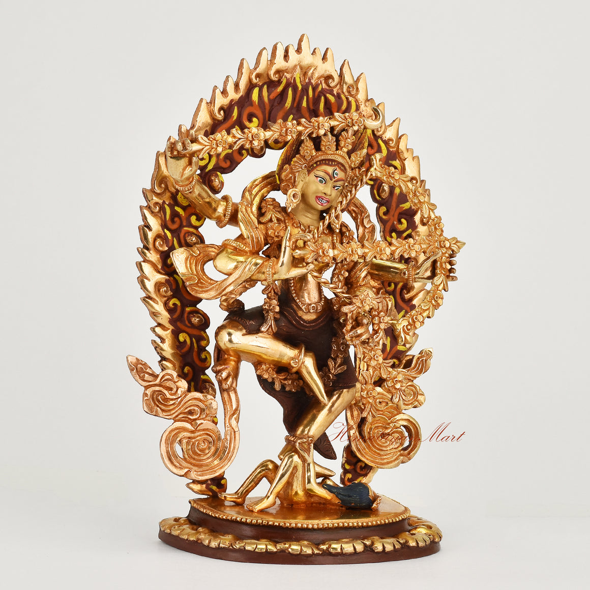 Right side view of handcrafted gold gilded face painted Kurukulla copper statue