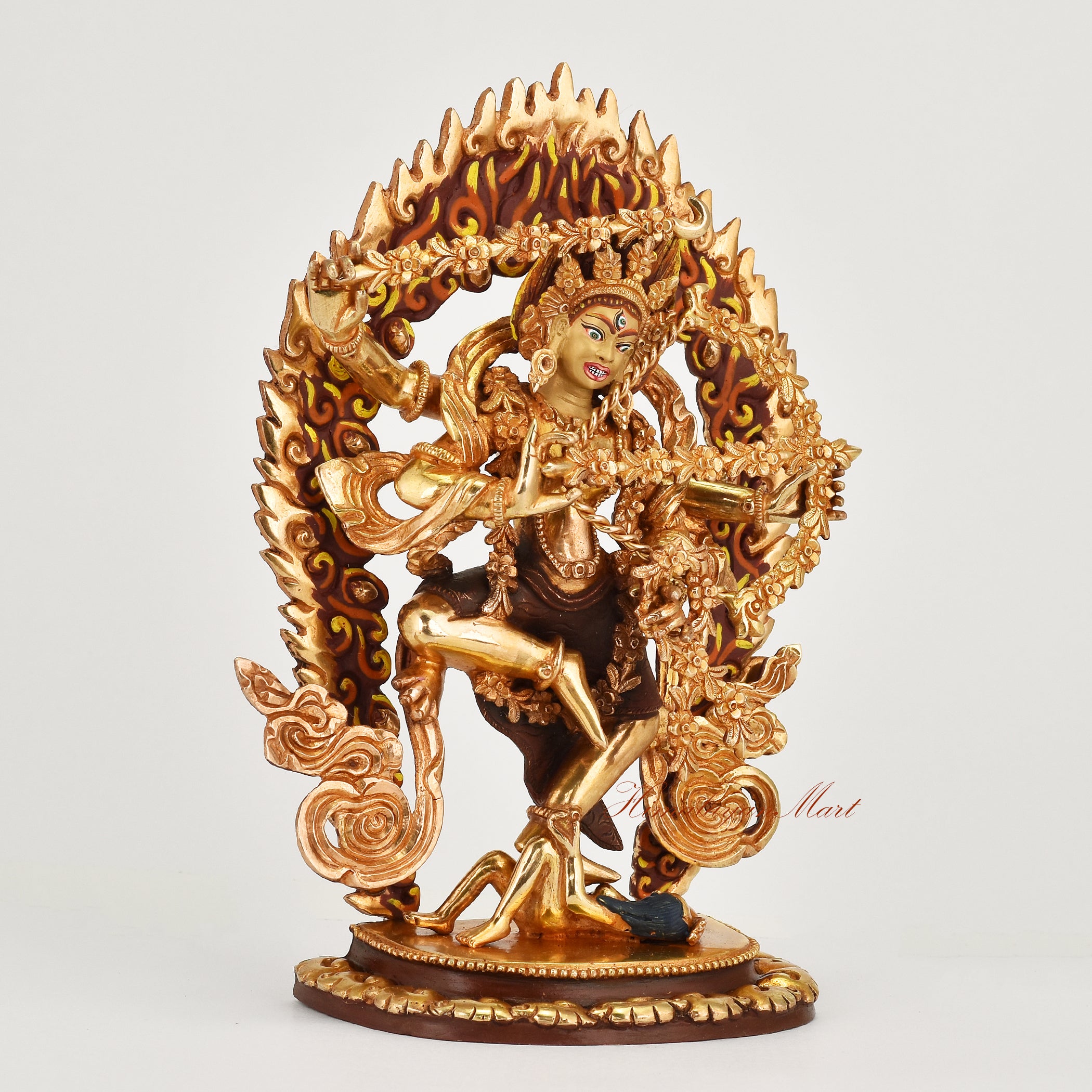 Right side view of handcrafted gold gilded face painted Kurukulla copper statue