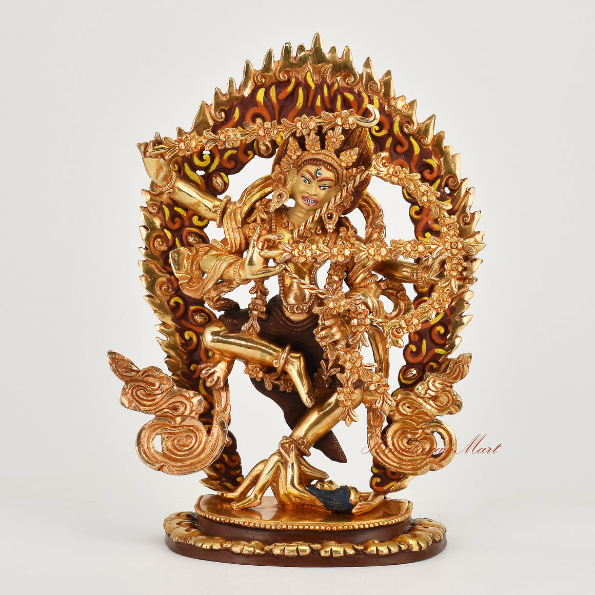 Handcrafted gold gilded face painted Kurukulla copper statue from Nepal front view