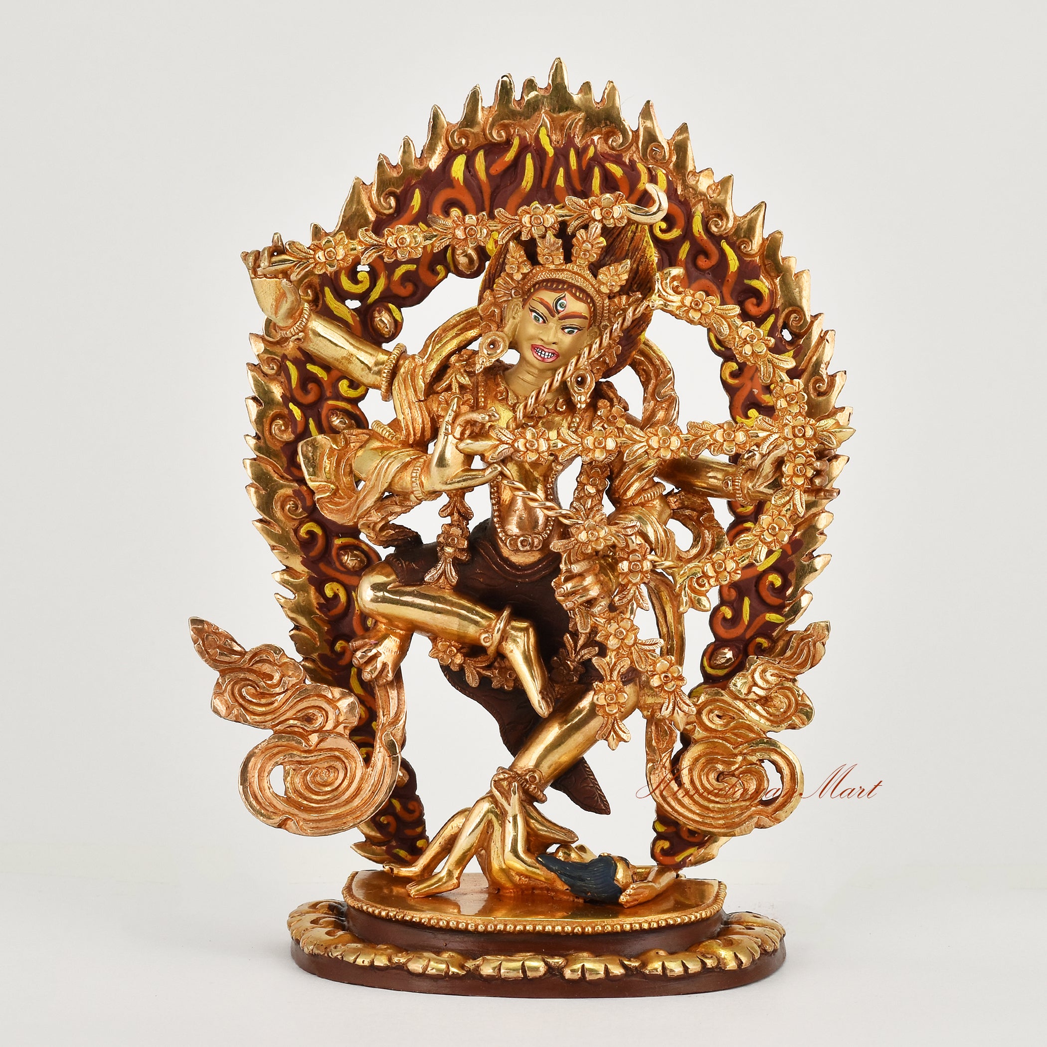 Handcrafted gold gilded face painted Kurukulla copper statue from Nepal front view