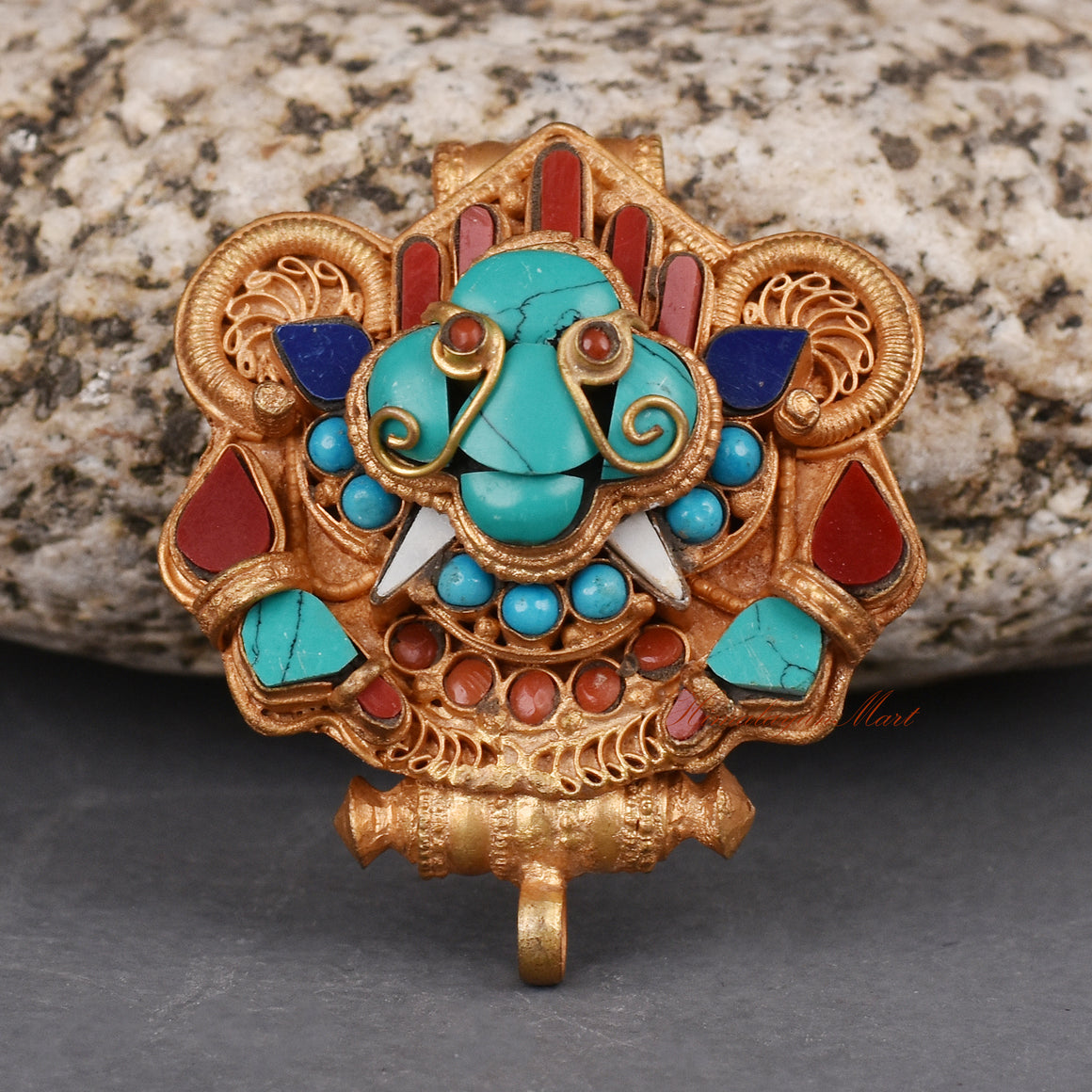 Handcrafted Cheppu Face Ghau prayer box pendant necklace with gold plating and semi-precious stones, made by Nepalese artisans.