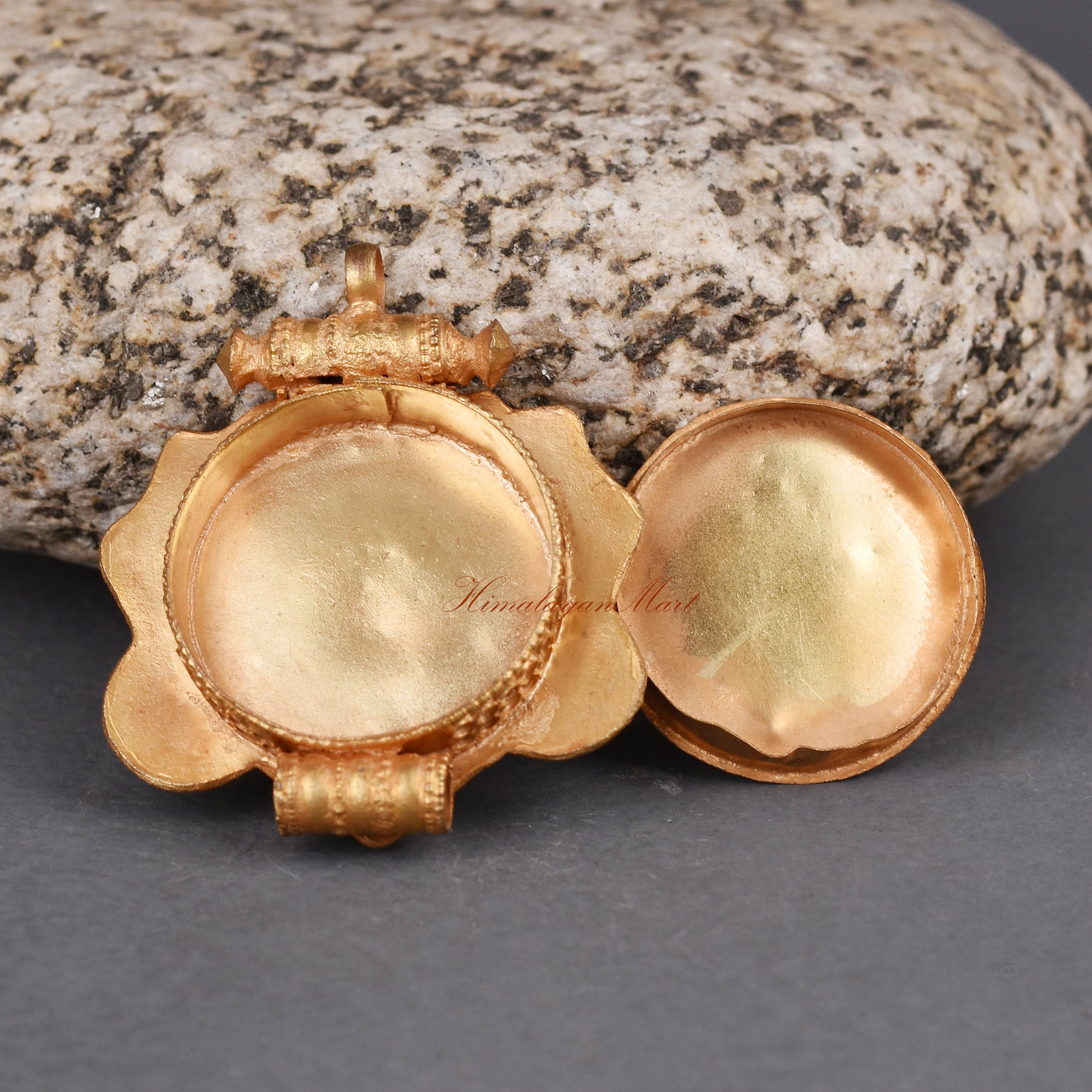 Open back view of Cheppu Face Ghau prayer box pendant designed to hold sacred relics, mantras, or blessings.