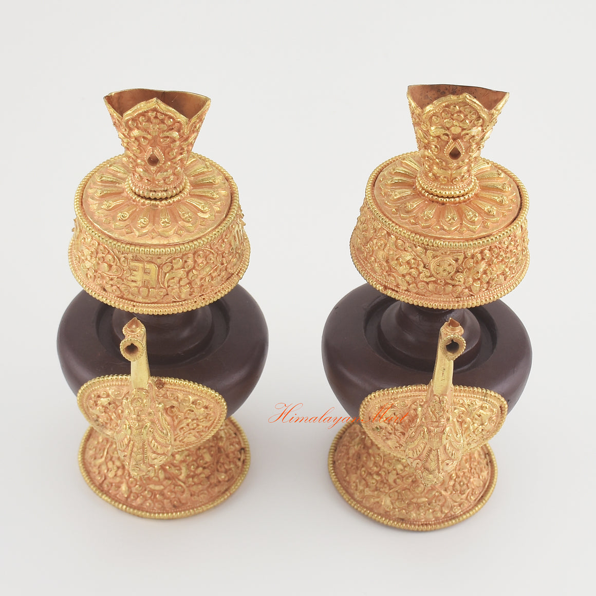Upper view of the Handcrafted Tibetan Bhumba Set showing ritual vase openings, carved rims, and gold-plated surfaces.