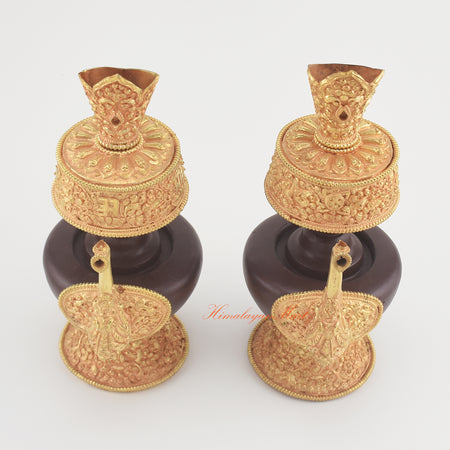 Upper view of the Handcrafted Tibetan Bhumba Set showing ritual vase openings, carved rims, and gold-plated surfaces.