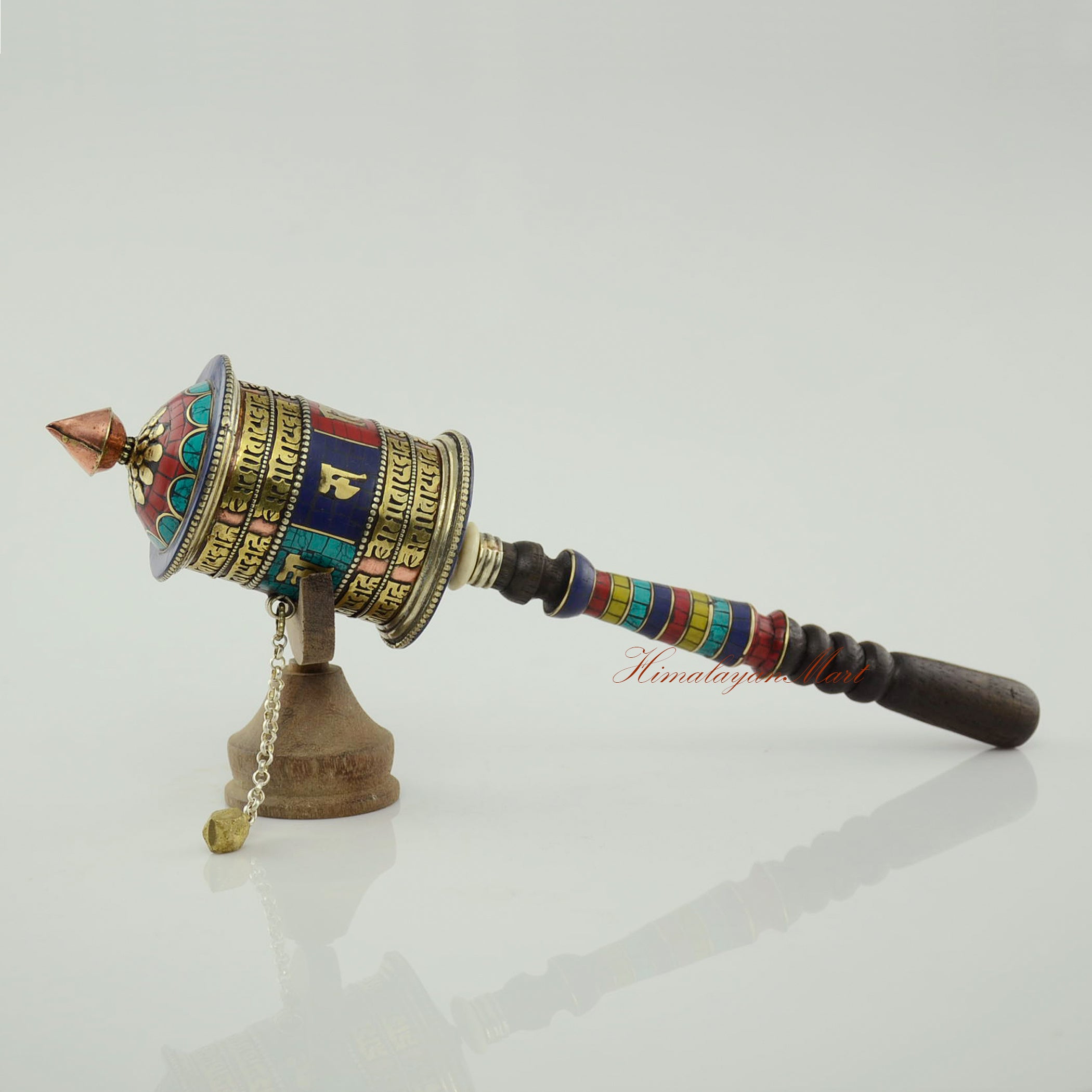 Left-angle perspective of Handheld Mani Prayer Wheel for mindful meditation and prayer