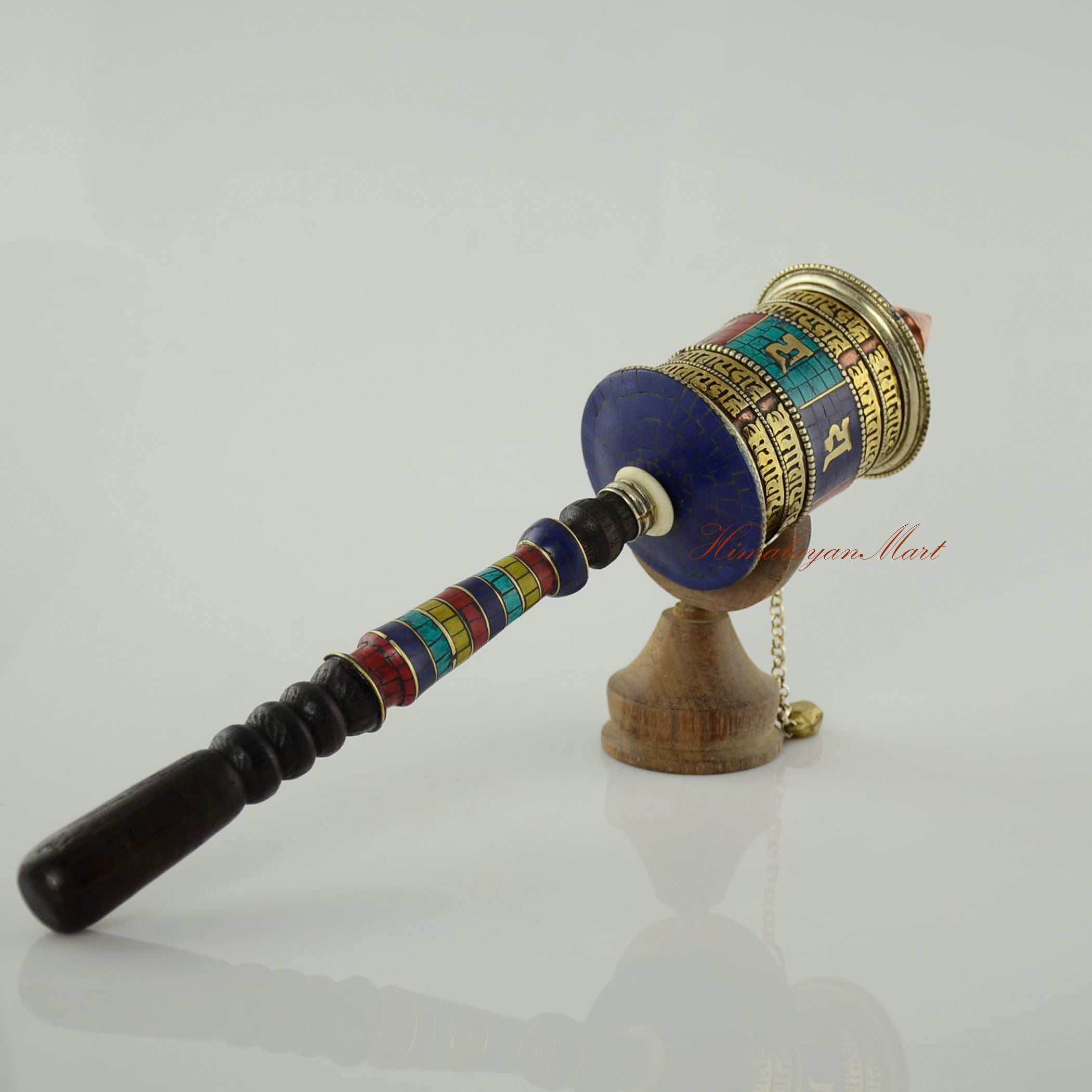 Side view of a Handheld Mani Prayer Wheel for meditation and spiritual devotion