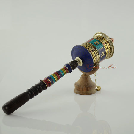 Side view of a Handheld Mani Prayer Wheel for meditation and spiritual devotion