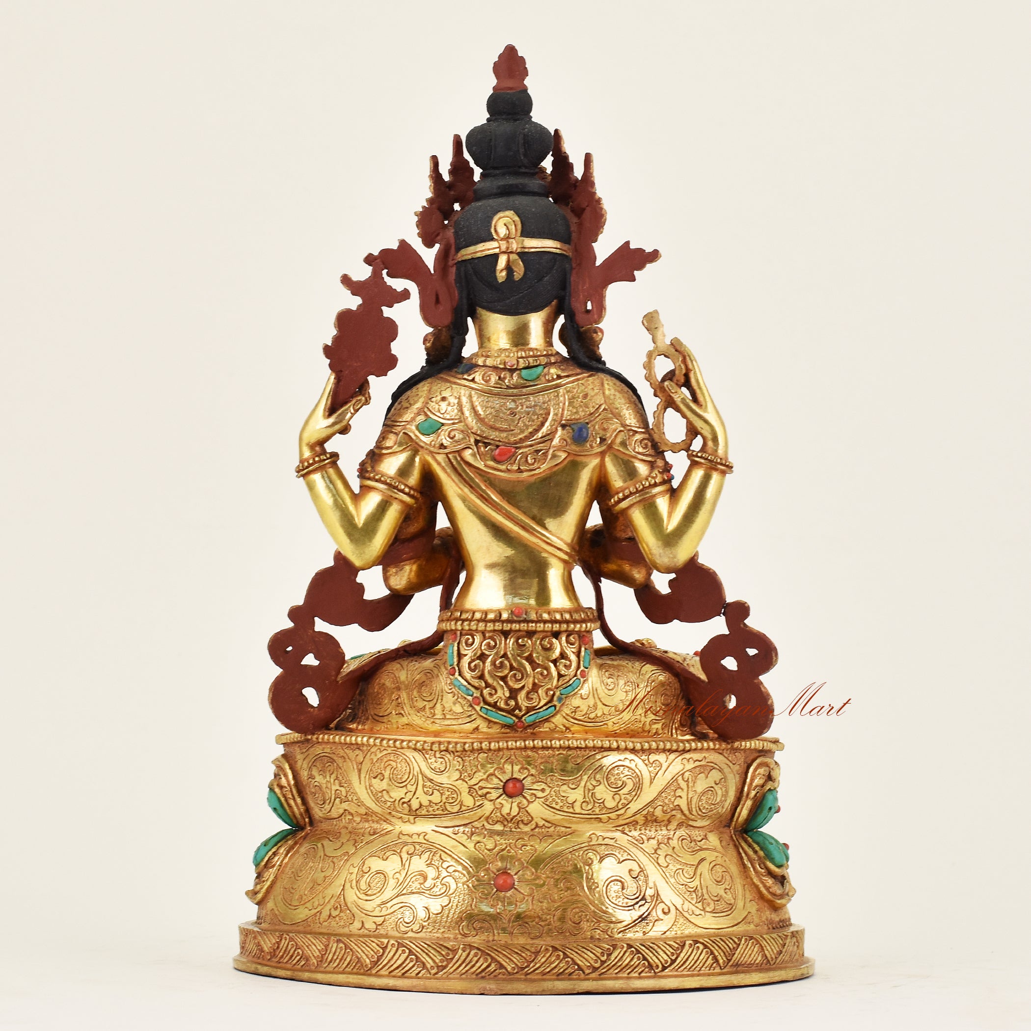 Back view of handmade Nepalese Chenrezig statue displaying intricate craftsmanship and traditional Tibetan Buddhist ornamentation