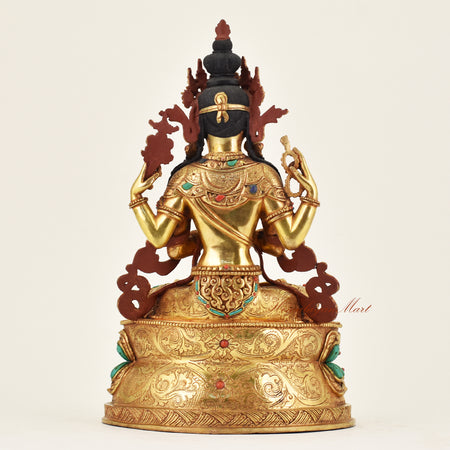 Back view of handmade Nepalese Chenrezig statue displaying intricate craftsmanship and traditional Tibetan Buddhist ornamentation
