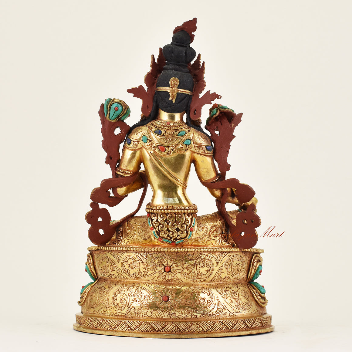 Back view of handmade Nepalese Green Tara statue highlighting traditional Tibetan Buddhist design, ornamental patterns, and artisan detailing