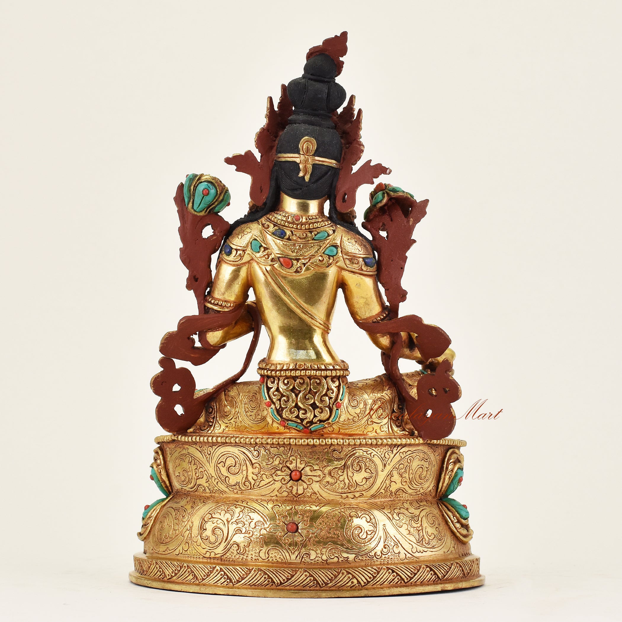 Back view of handmade Nepalese Green Tara statue highlighting traditional Tibetan Buddhist design, ornamental patterns, and artisan detailing