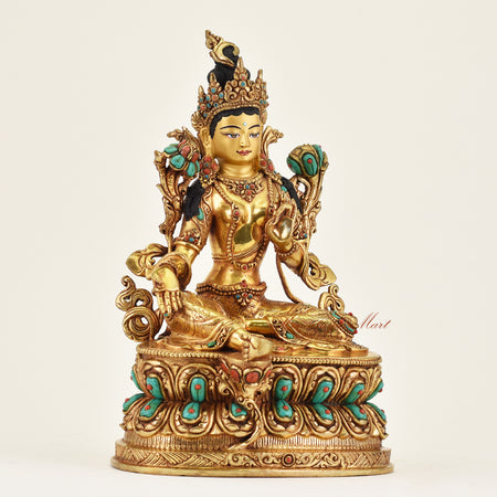 Right side view of handmade Nepalese Green Tara statue showing detailed robes, sacred ornaments, and traditional Nepalese craftsmanship