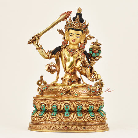 Handmade Nepalese Manjushri statue depicting the Buddha of wisdom and enlightenment, finely gilded with traditional Buddhist craftsmanship