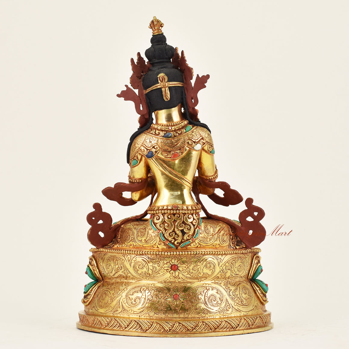 Back view of handmade Nepalese Vajradhara statue displaying fine craftsmanship, traditional patterns, and spiritual iconography for meditation practice.